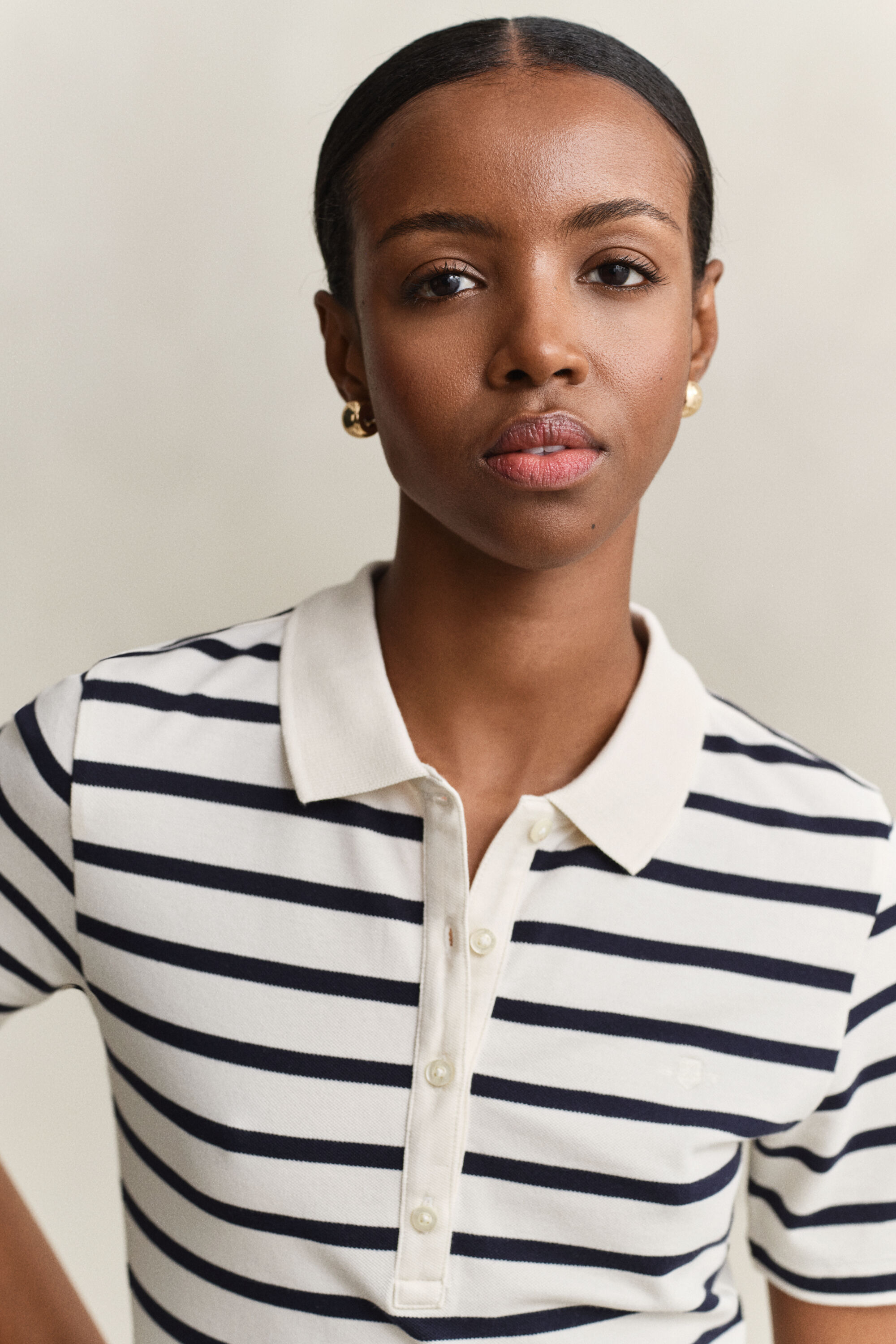 Polo a righe in piqué