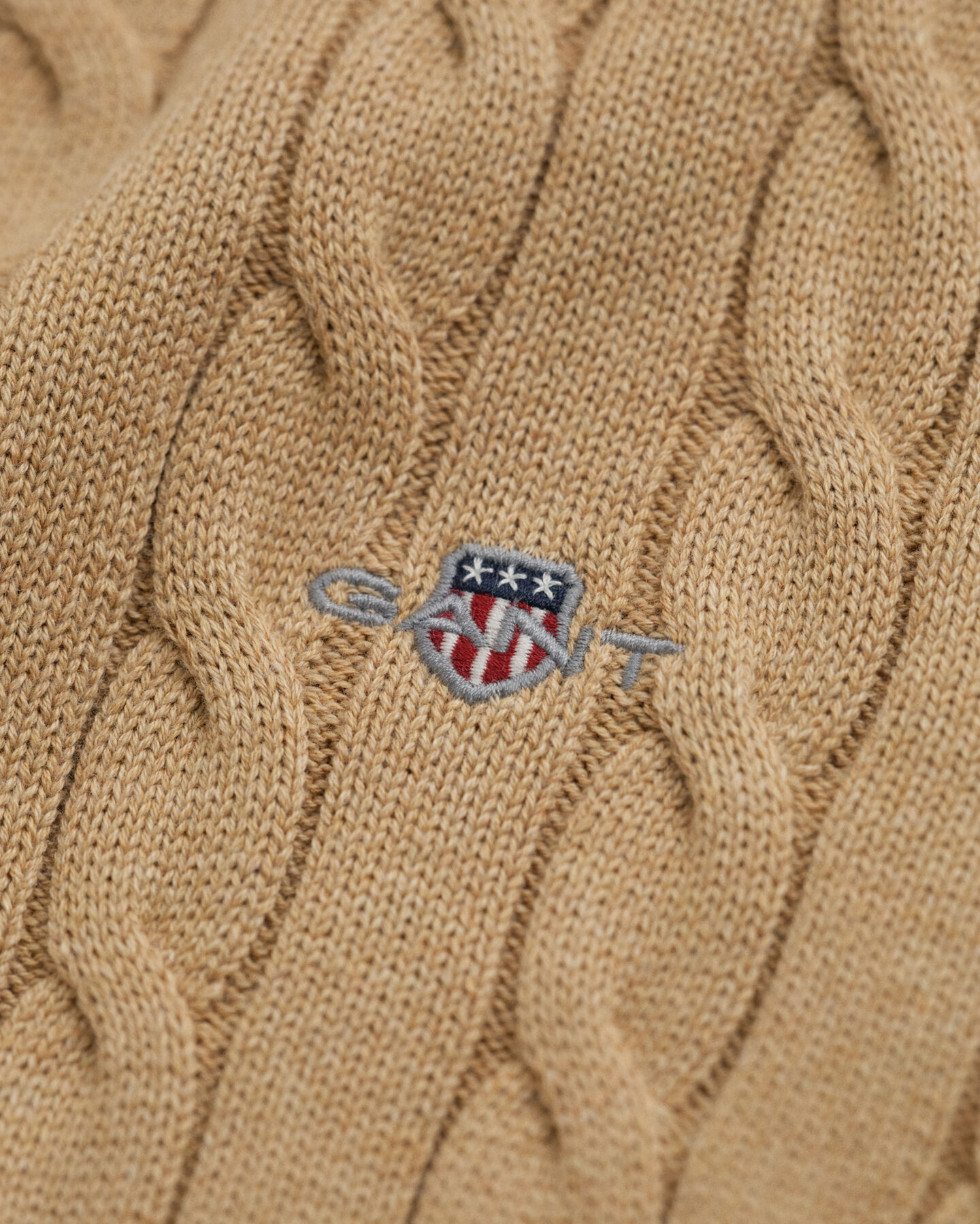 Maglia a collo alto in cotone a trecce