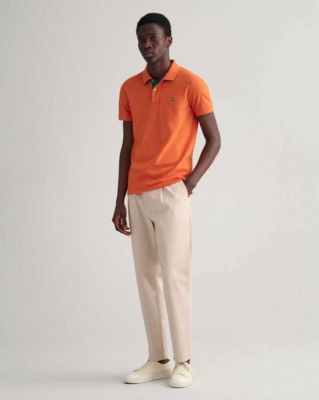 Polo in piqu&eacute; con colletto a contrasto