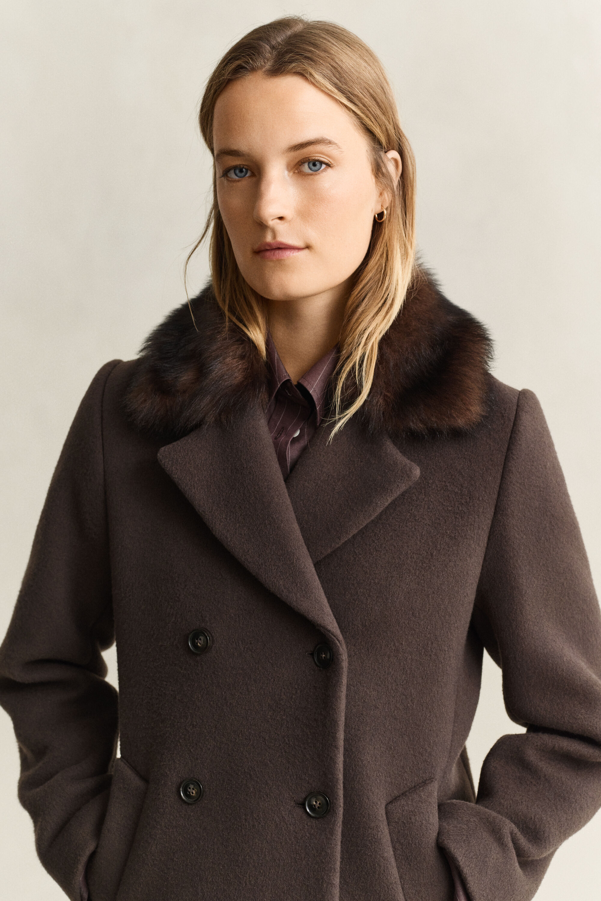 Cappotto con colletto in shearling