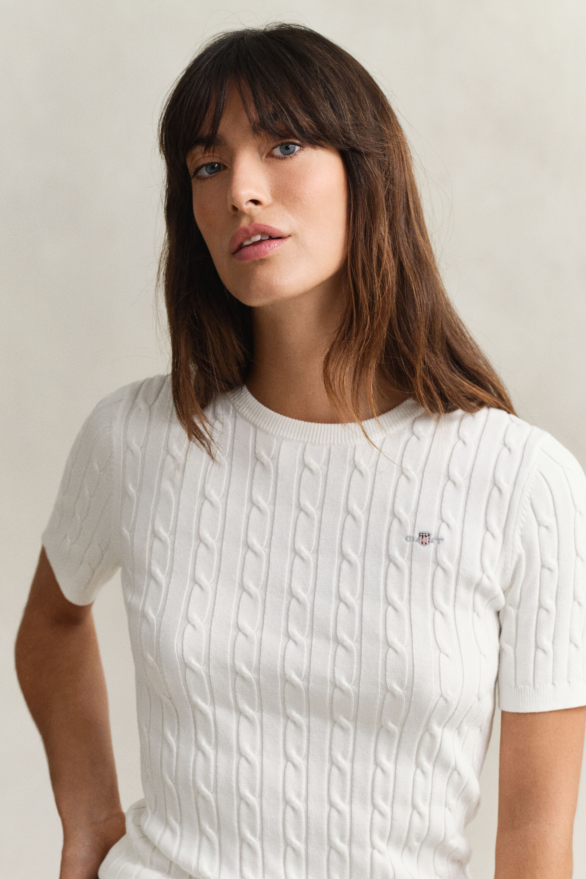 Maglia a trecce con maniche corte