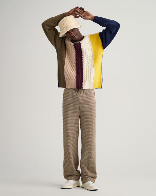 Maglia girocollo in cotone con patchwork di trecce