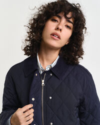 Piumino trapuntato con dettagli in velluto a coste