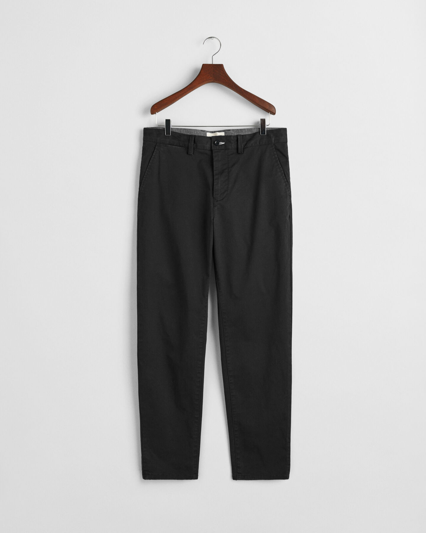 Pantaloni chino in twill stretti in fondo