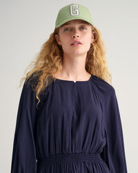 Abito con scollo a barchetta