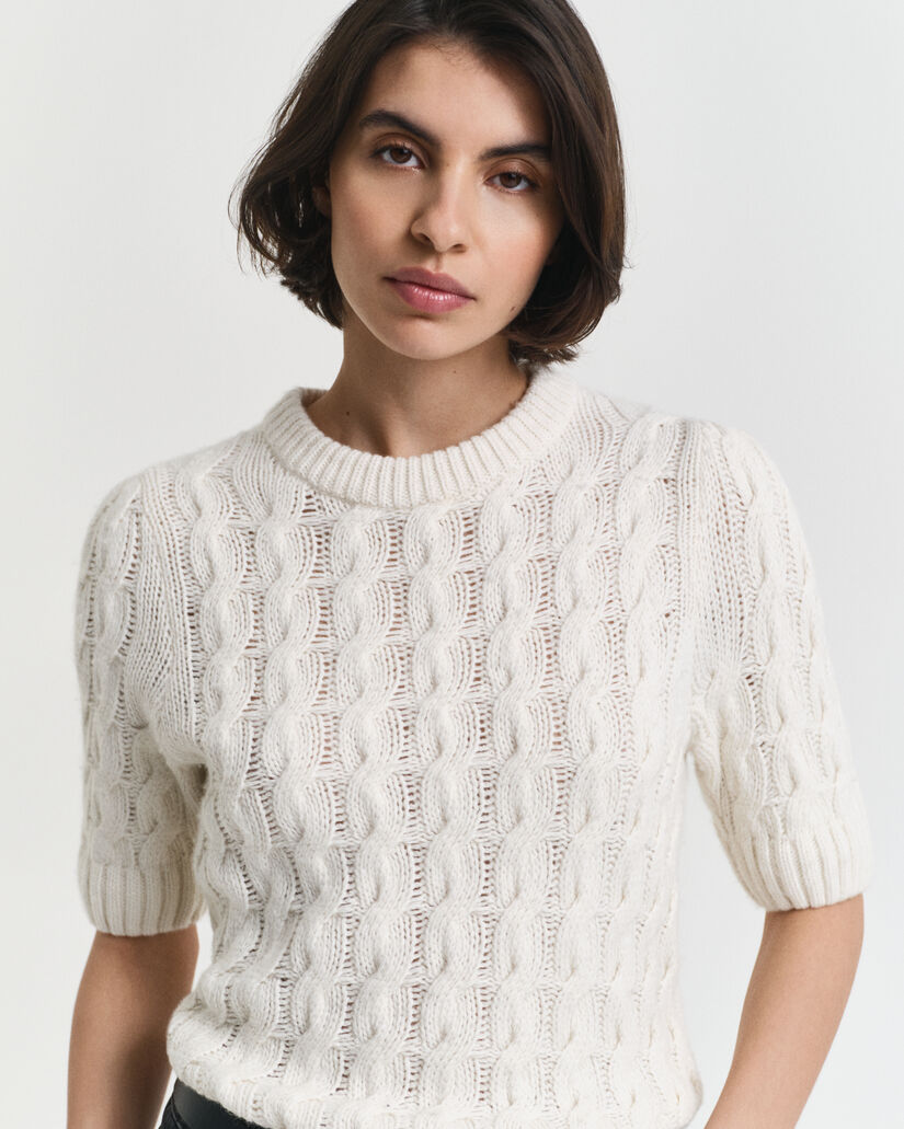 Top a maniche corte a sbuffo in maglia a trecce