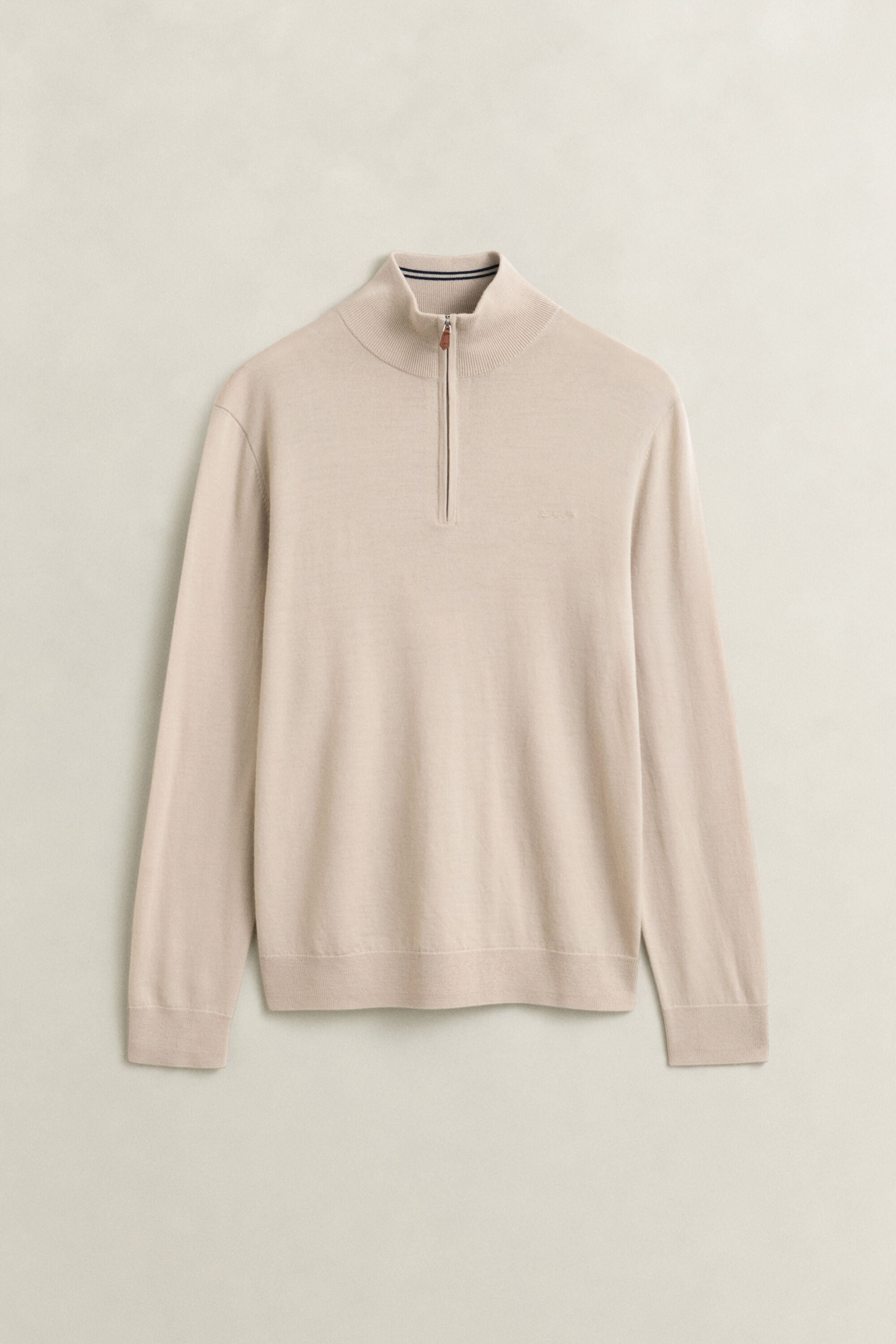 Maglia in lana merino a coste con zip corta