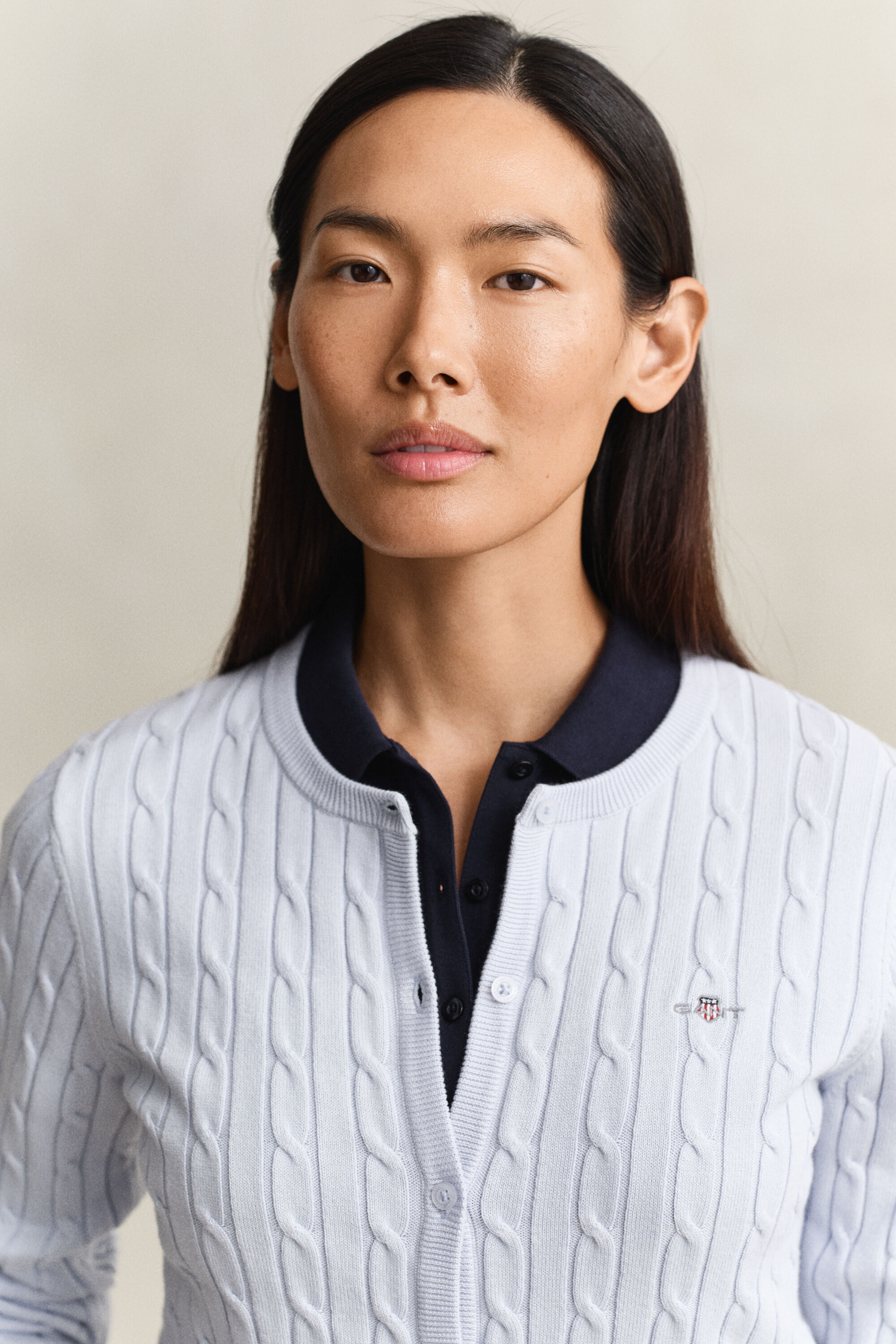 Cardigan in maglia con lavorazione a trecce