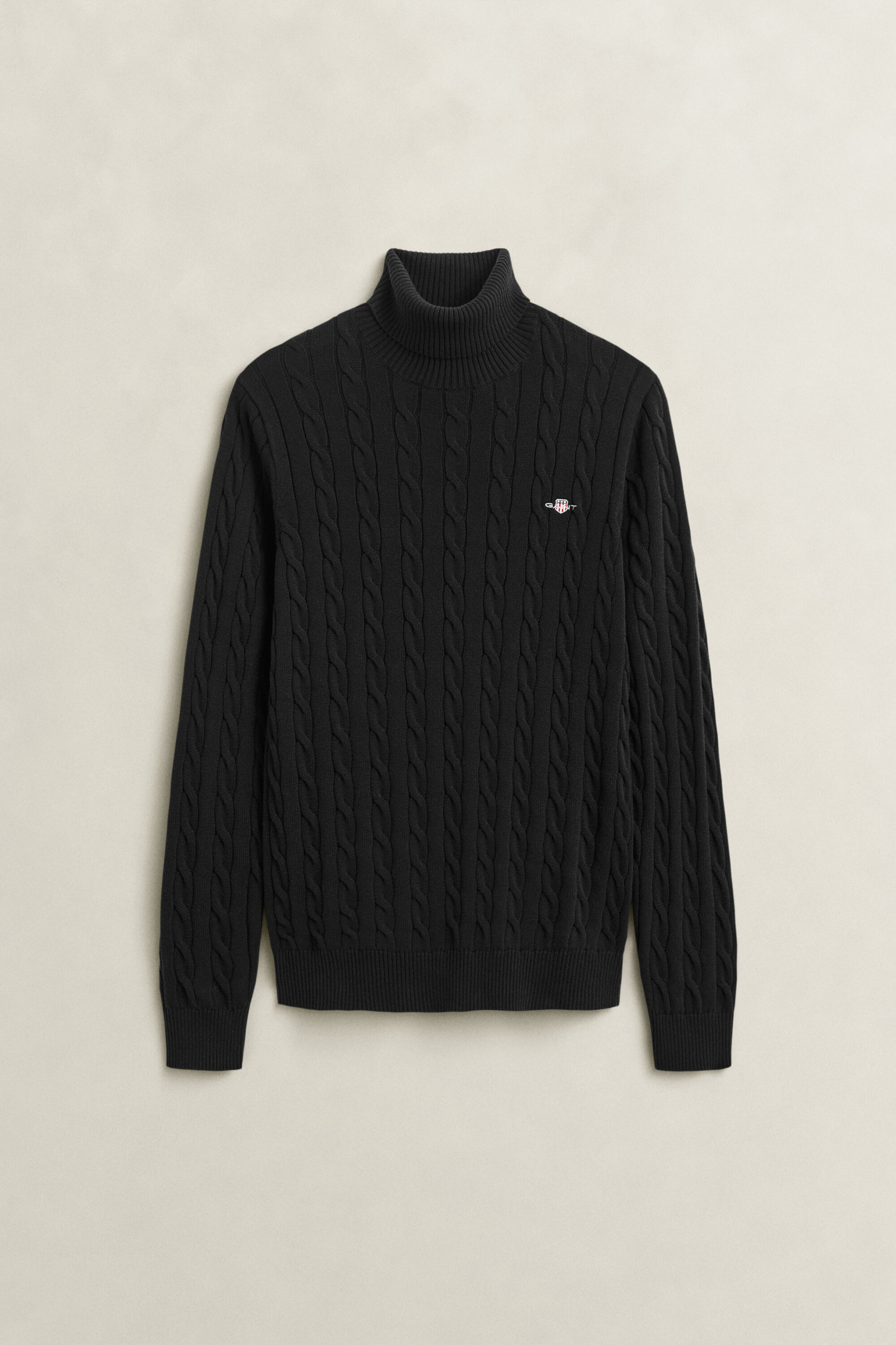 Maglia a collo alto in cotone a trecce