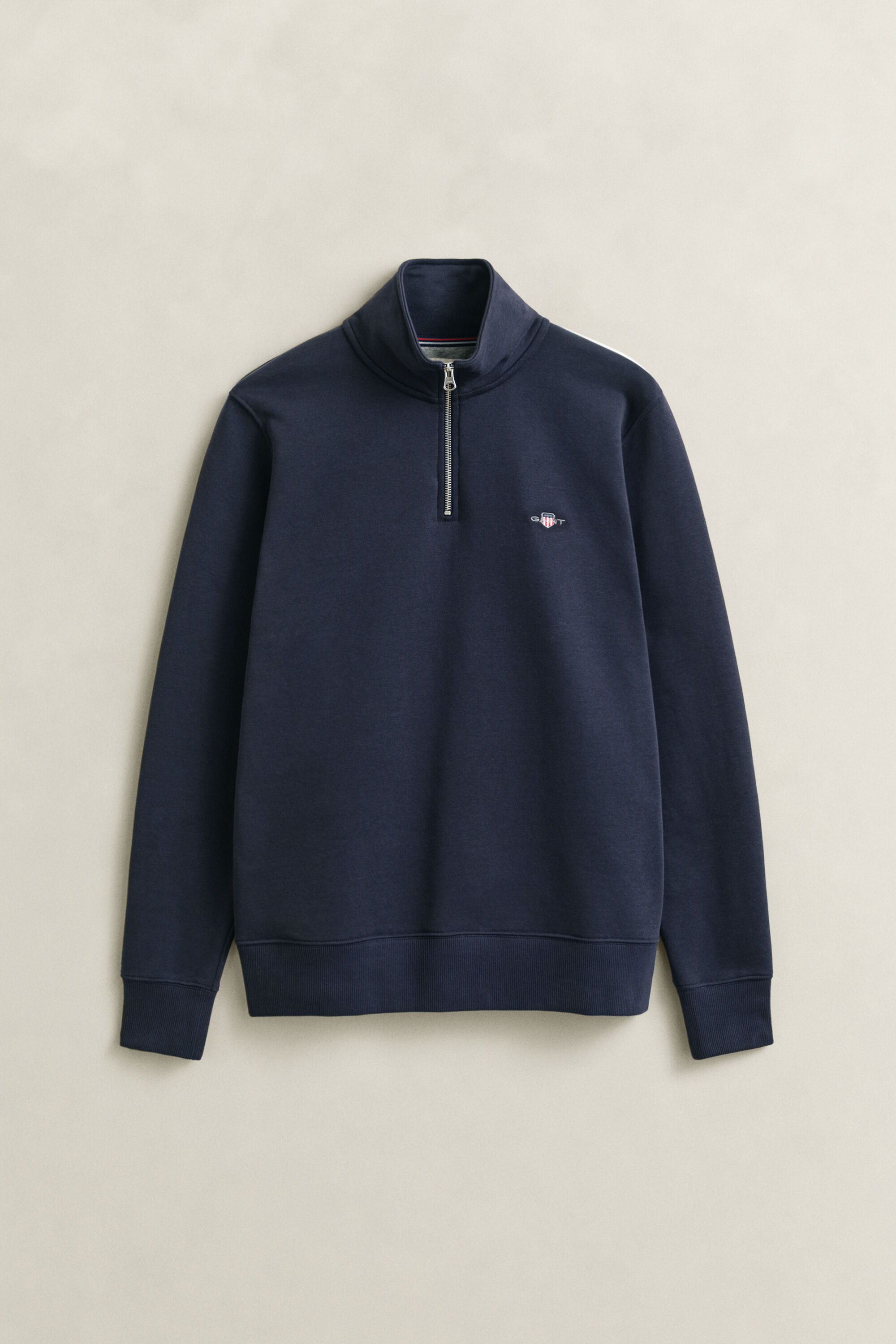 Felpa Shield con zip corta