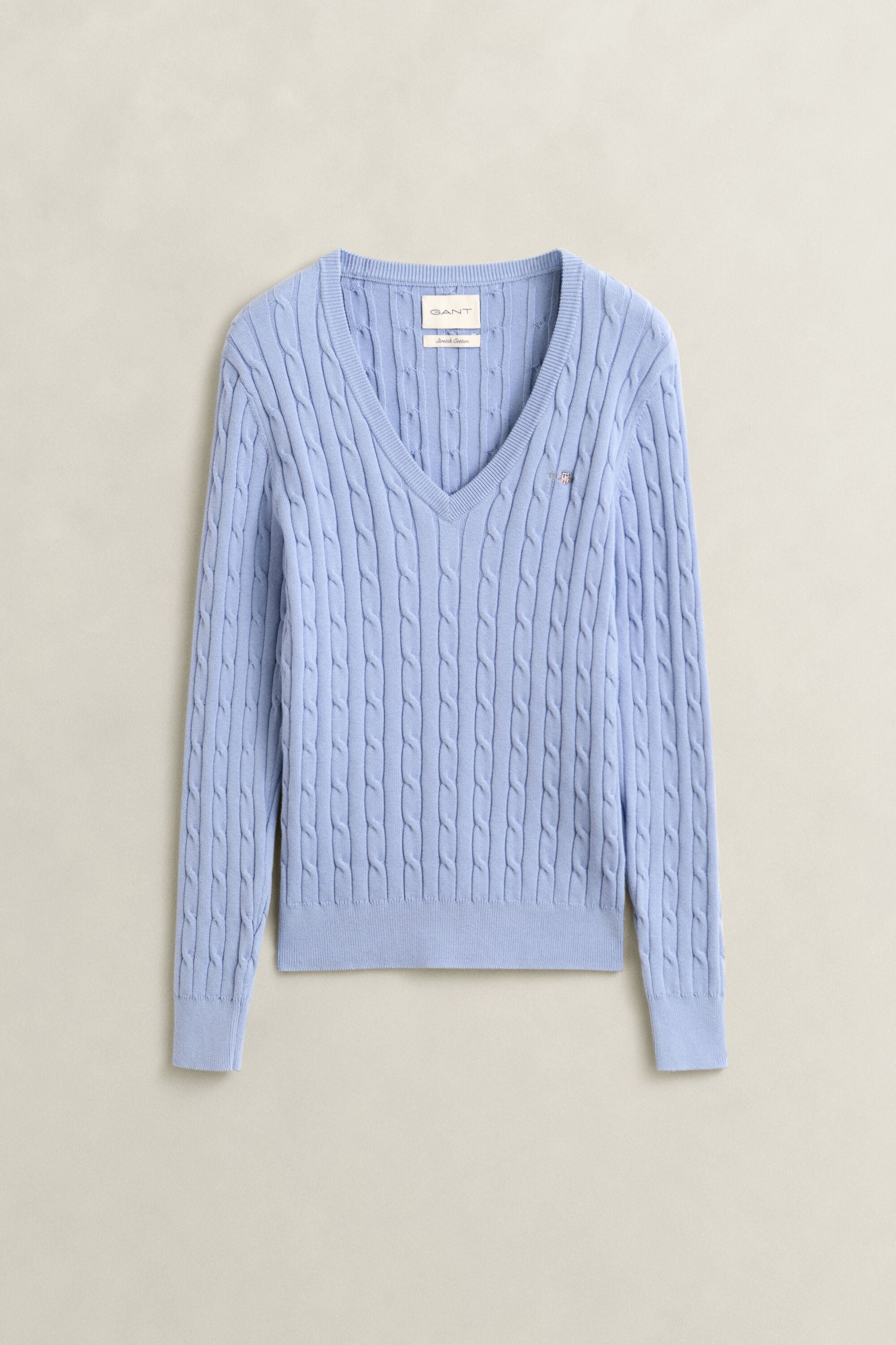 Maglia con scollo a V in cotone elasticizzato a trecce