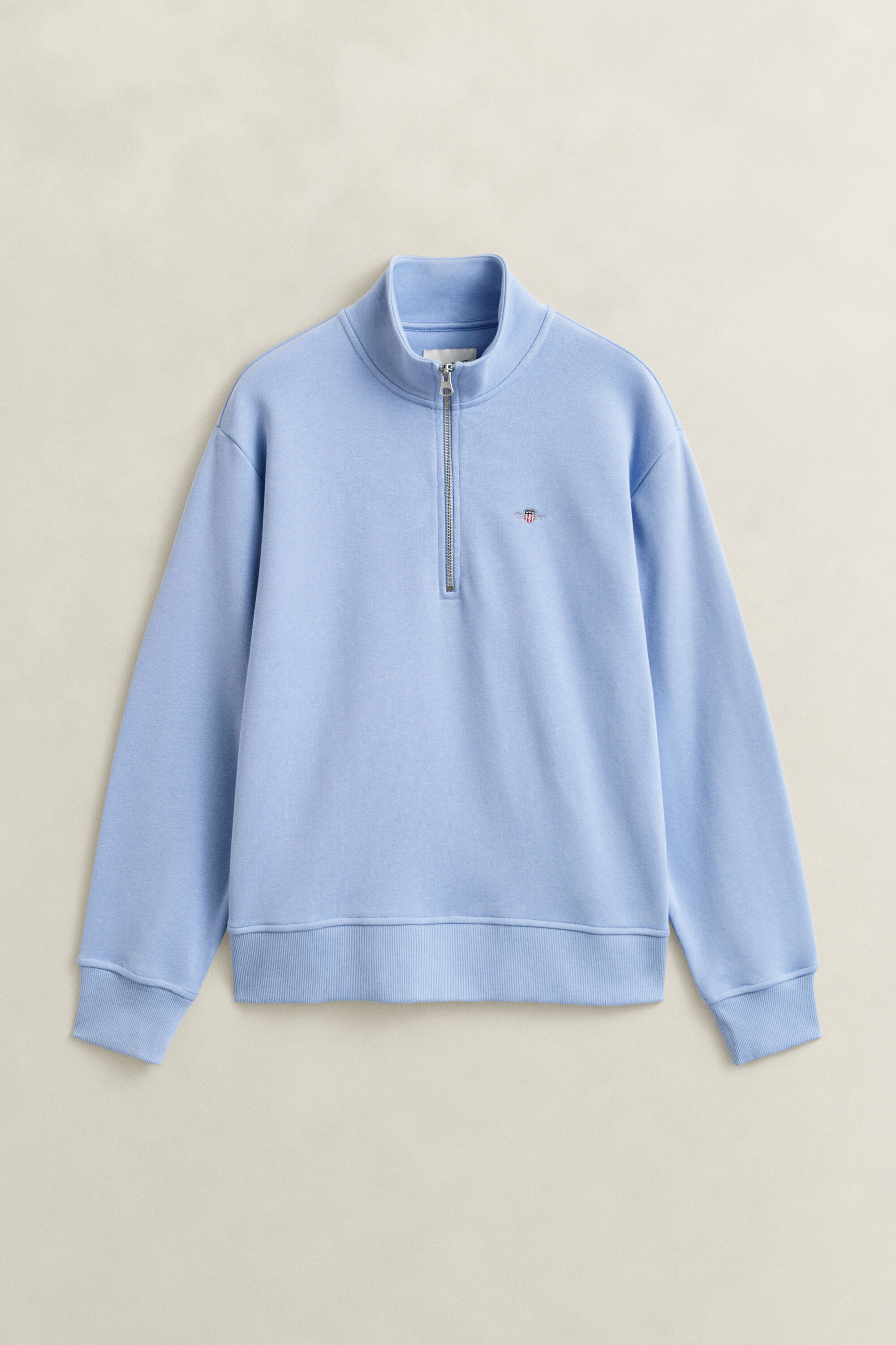 Felpa Shield con zip corta