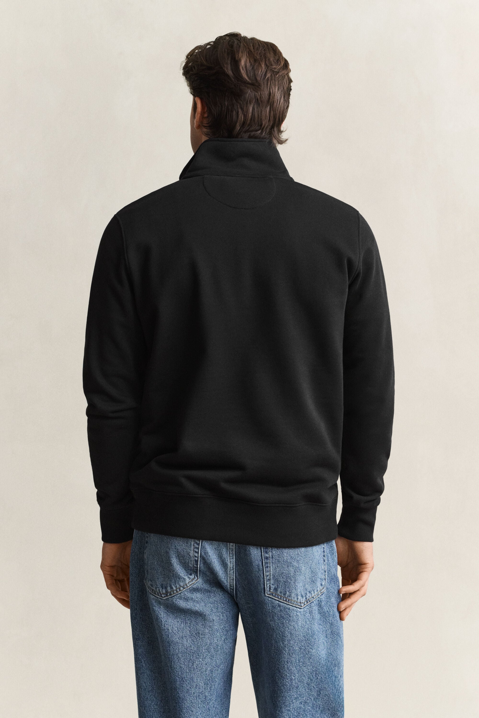 Felpa Shield con zip corta