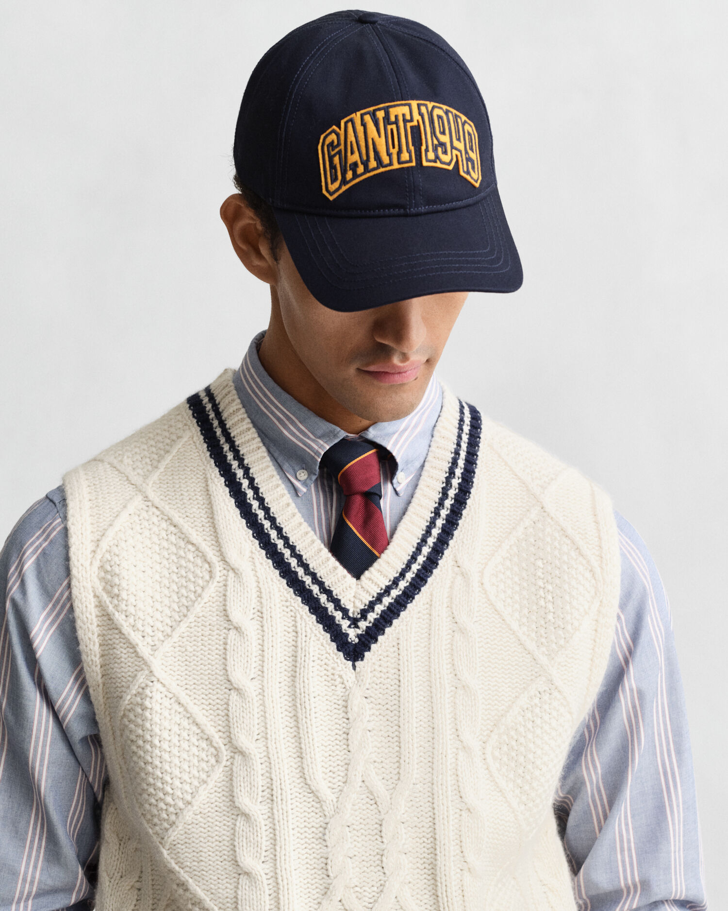 Smanicato in maglia a trecce