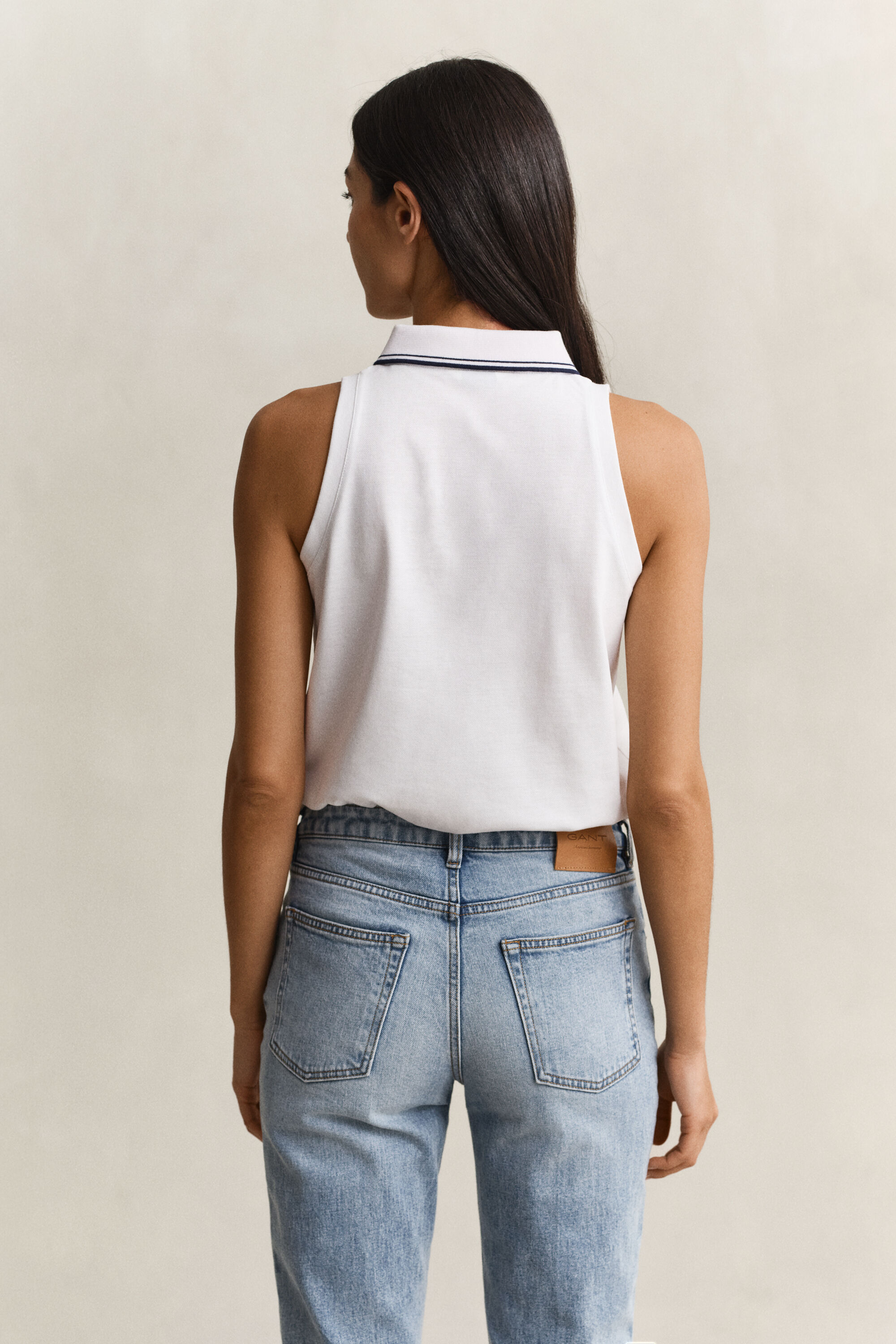 Polo smanicata in piqué