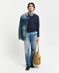 Maglia con scollo a V in finissima lana d’agnello