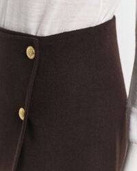 Gonna midi a portafoglio cucita a mano