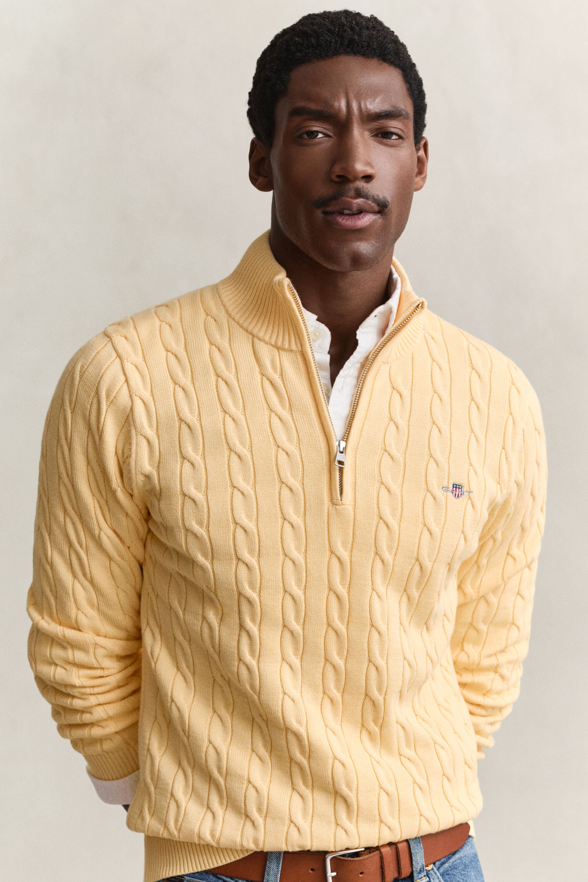 Maglia con zip corta in cotone a trecce