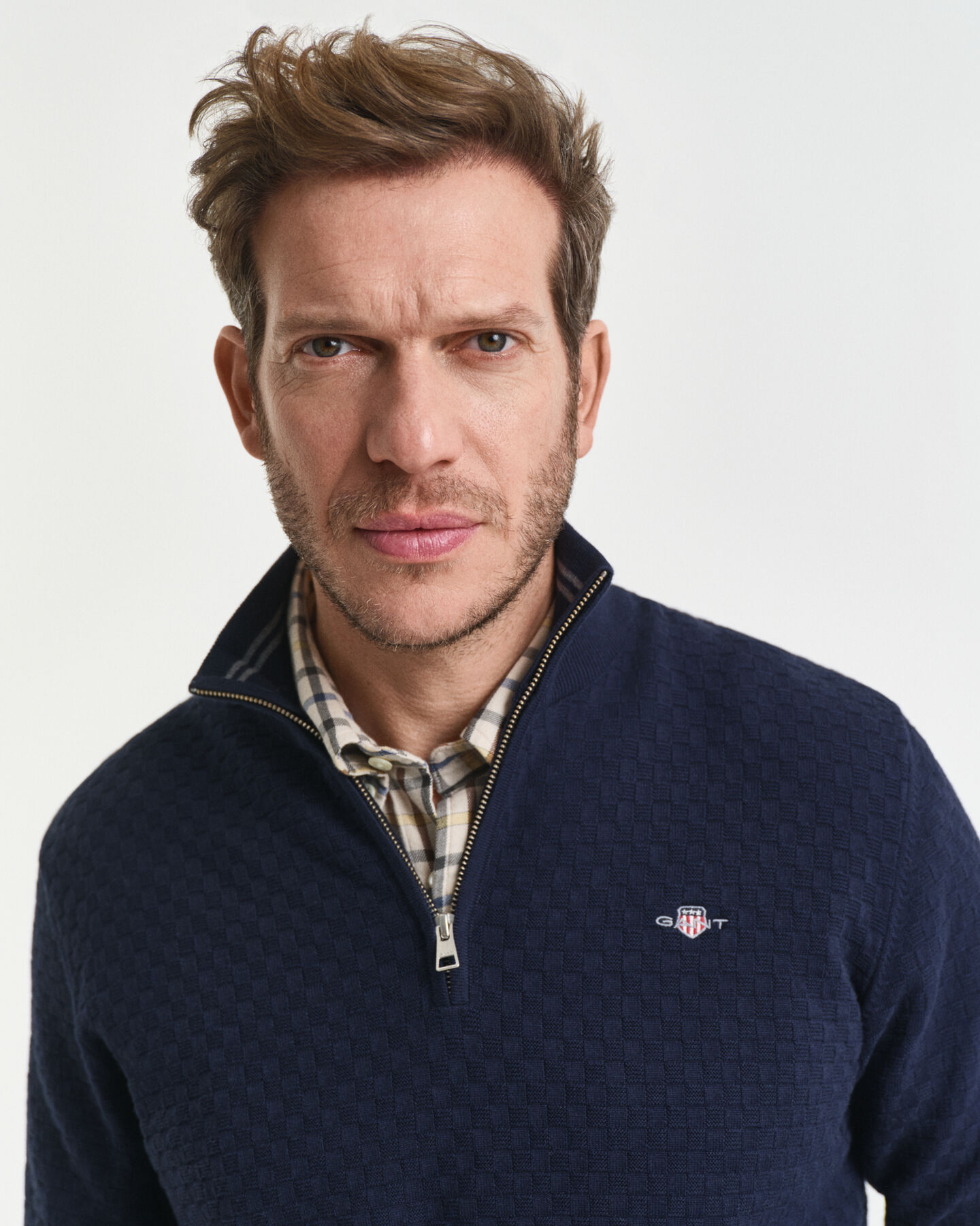 Maglia micro testurizzata con zip corta