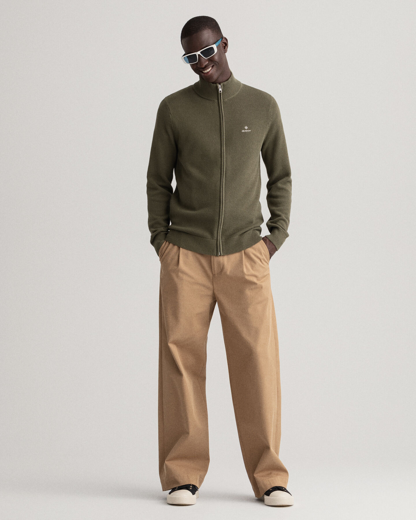 Cardigan in piqu&eacute; di cotone con zip corta