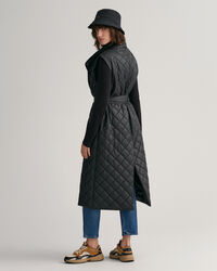 Piumino smanicato trapuntato lungo