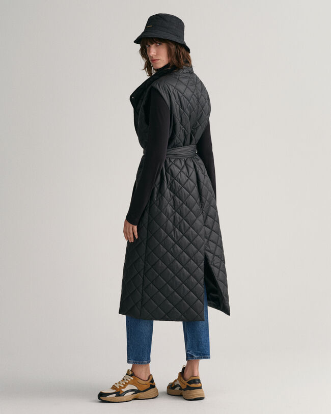 Piumino smanicato trapuntato lungo