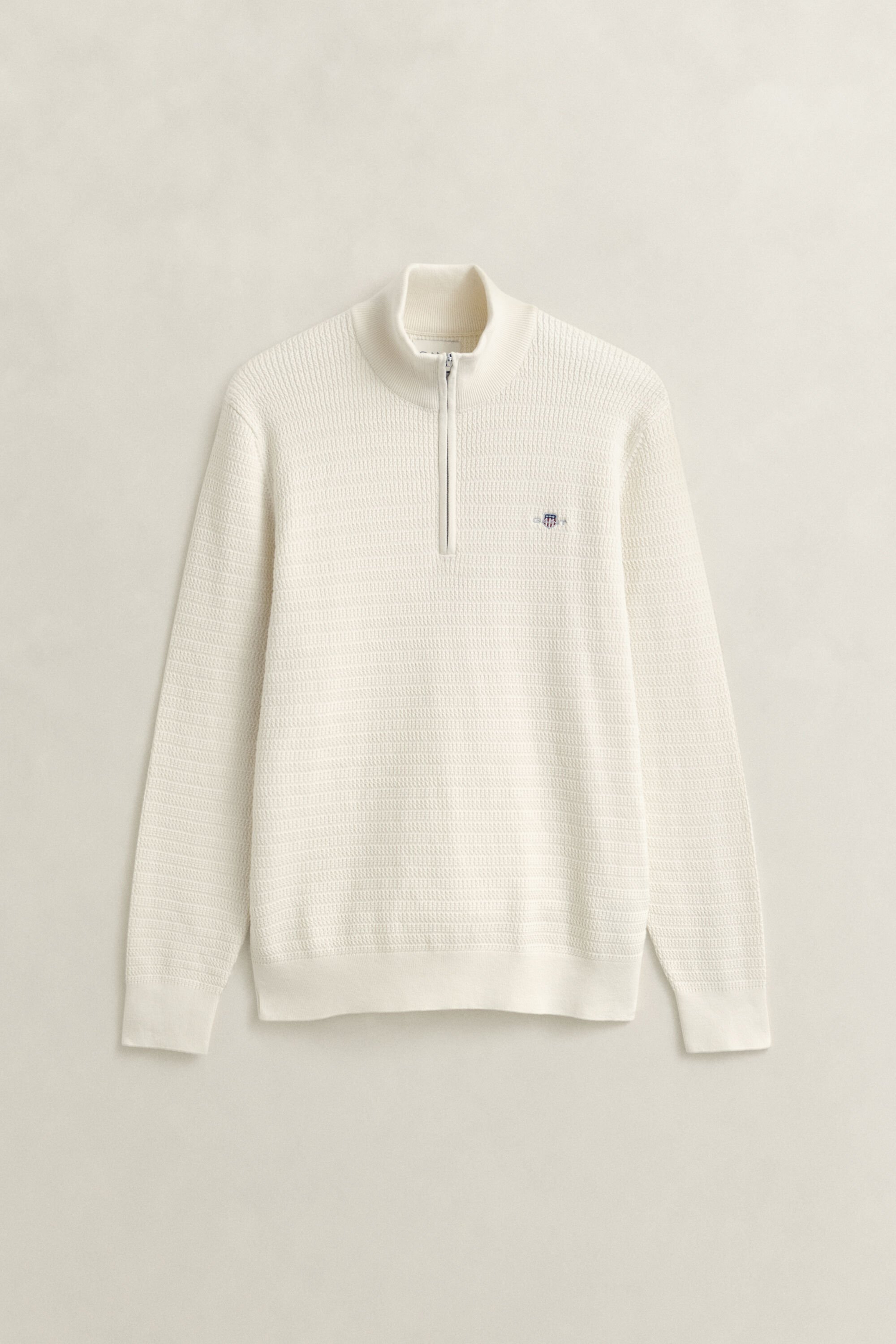 Maglia con zip corta a mini trecce