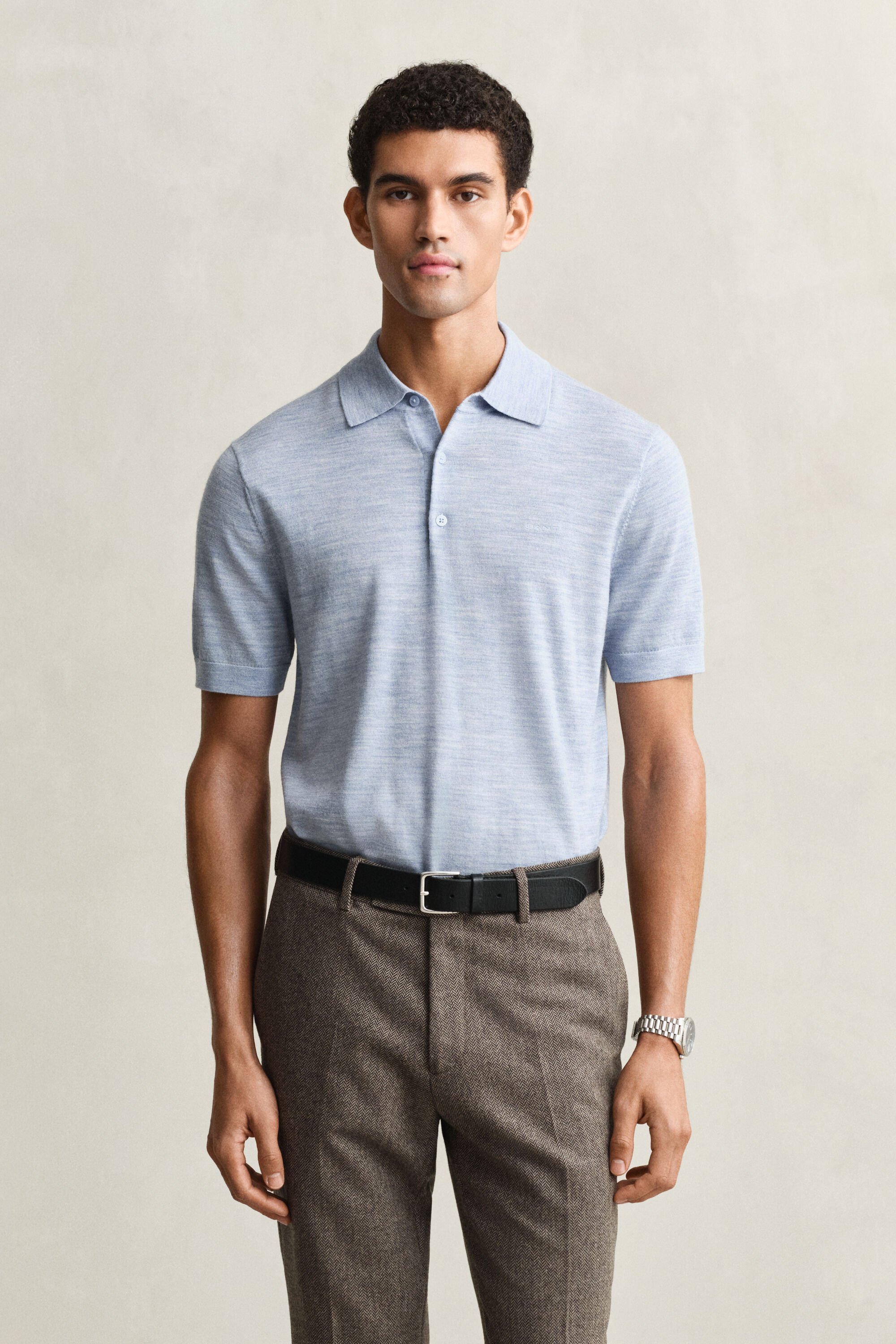 Polo a maniche corte realizzata in pregiata lana merino