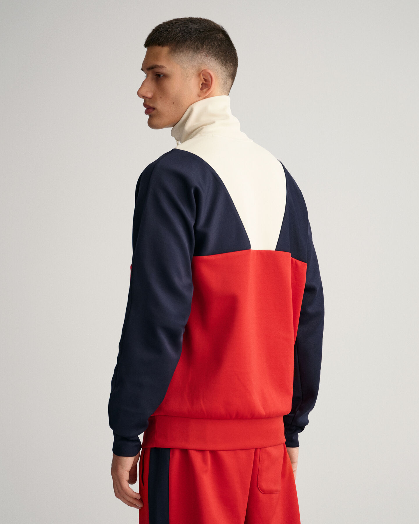 Maglia Tracksuit Crest Shield con zip corta