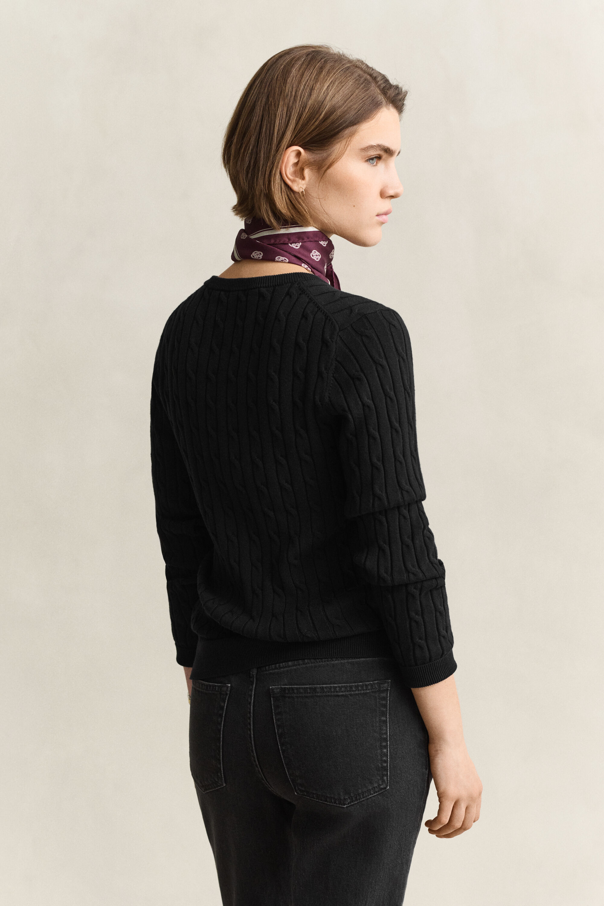 Cardigan in maglia con lavorazione a trecce