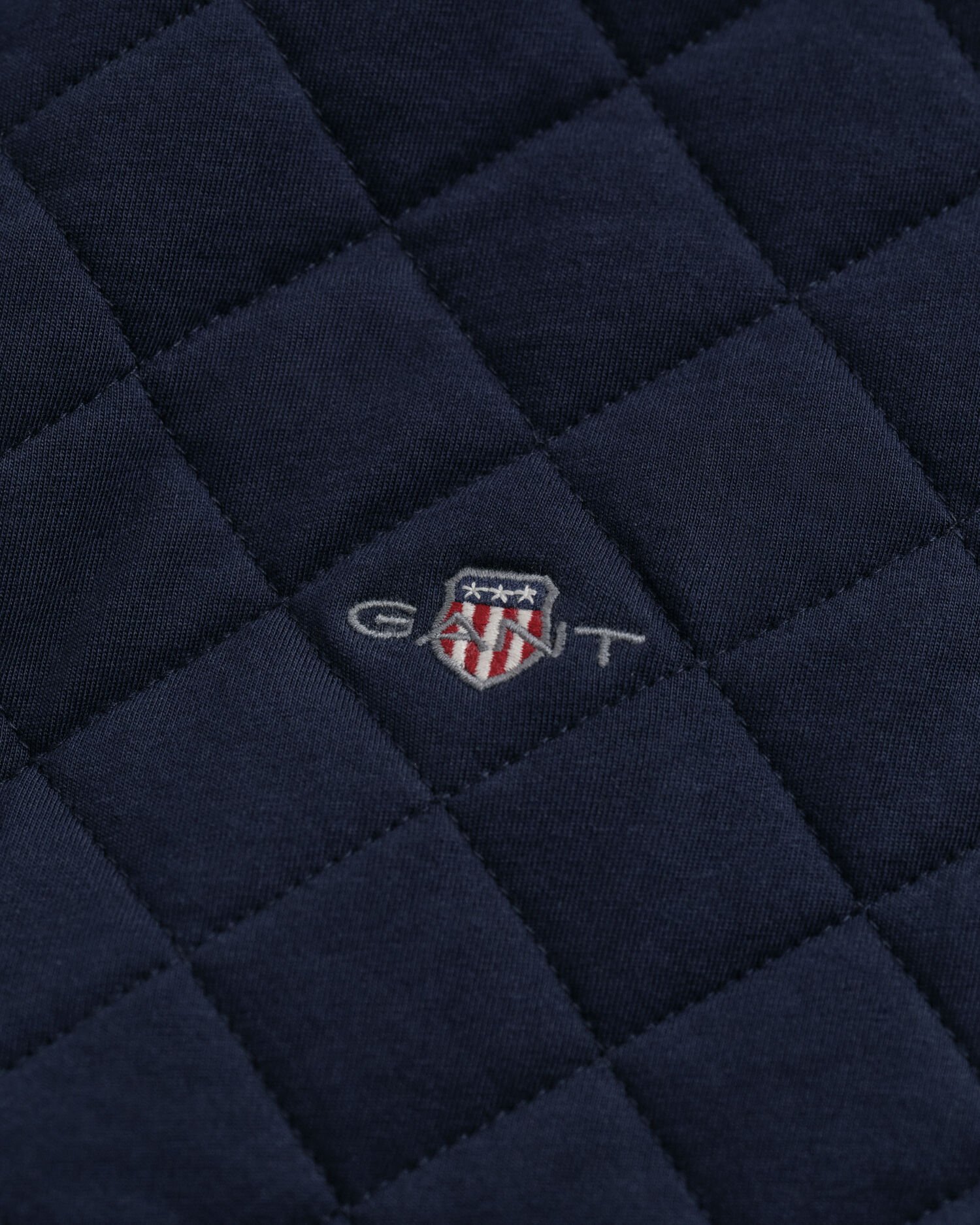 Felpa trapuntata con zip e colletto in velluto a coste