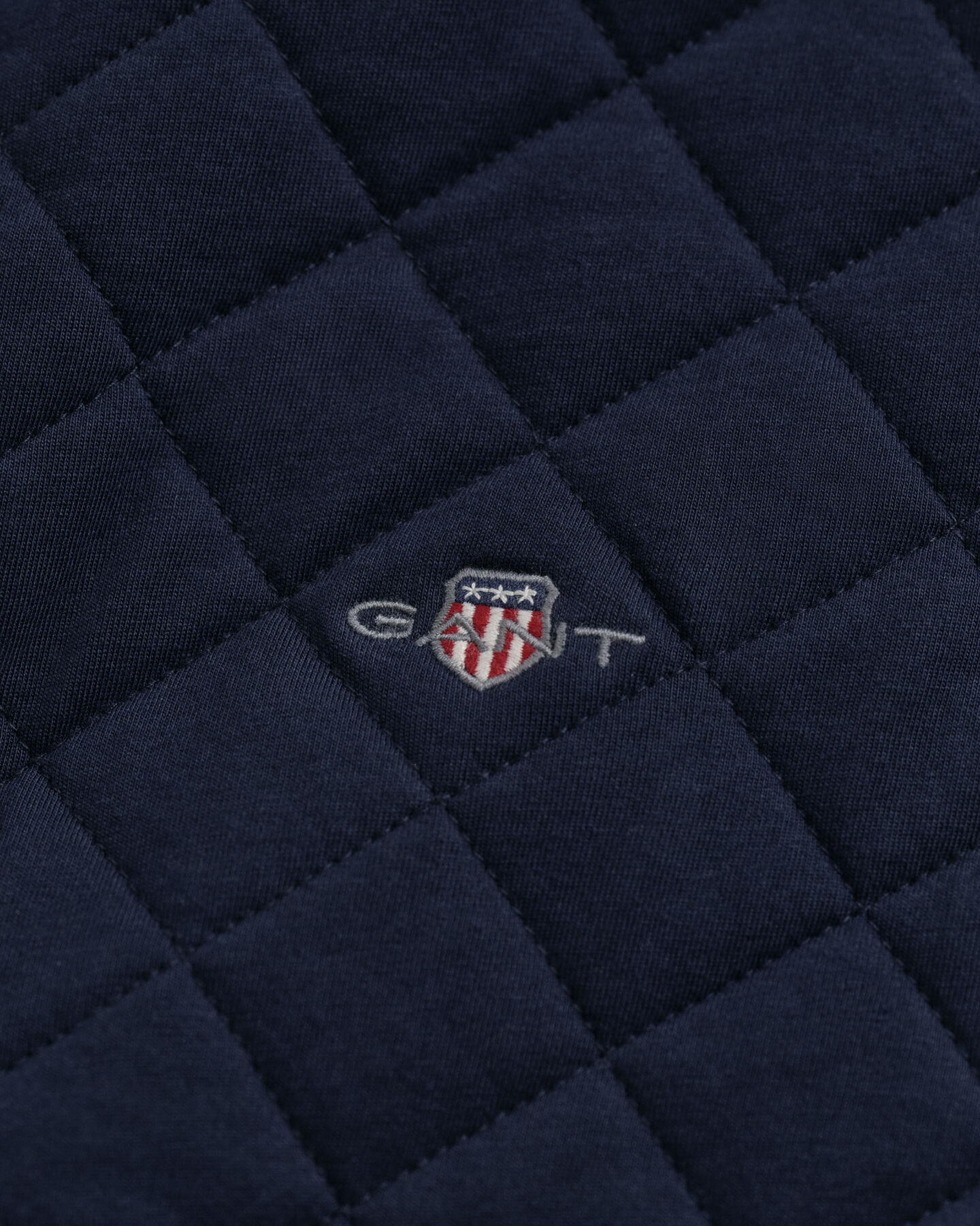 Felpa trapuntata con zip e colletto in velluto a coste