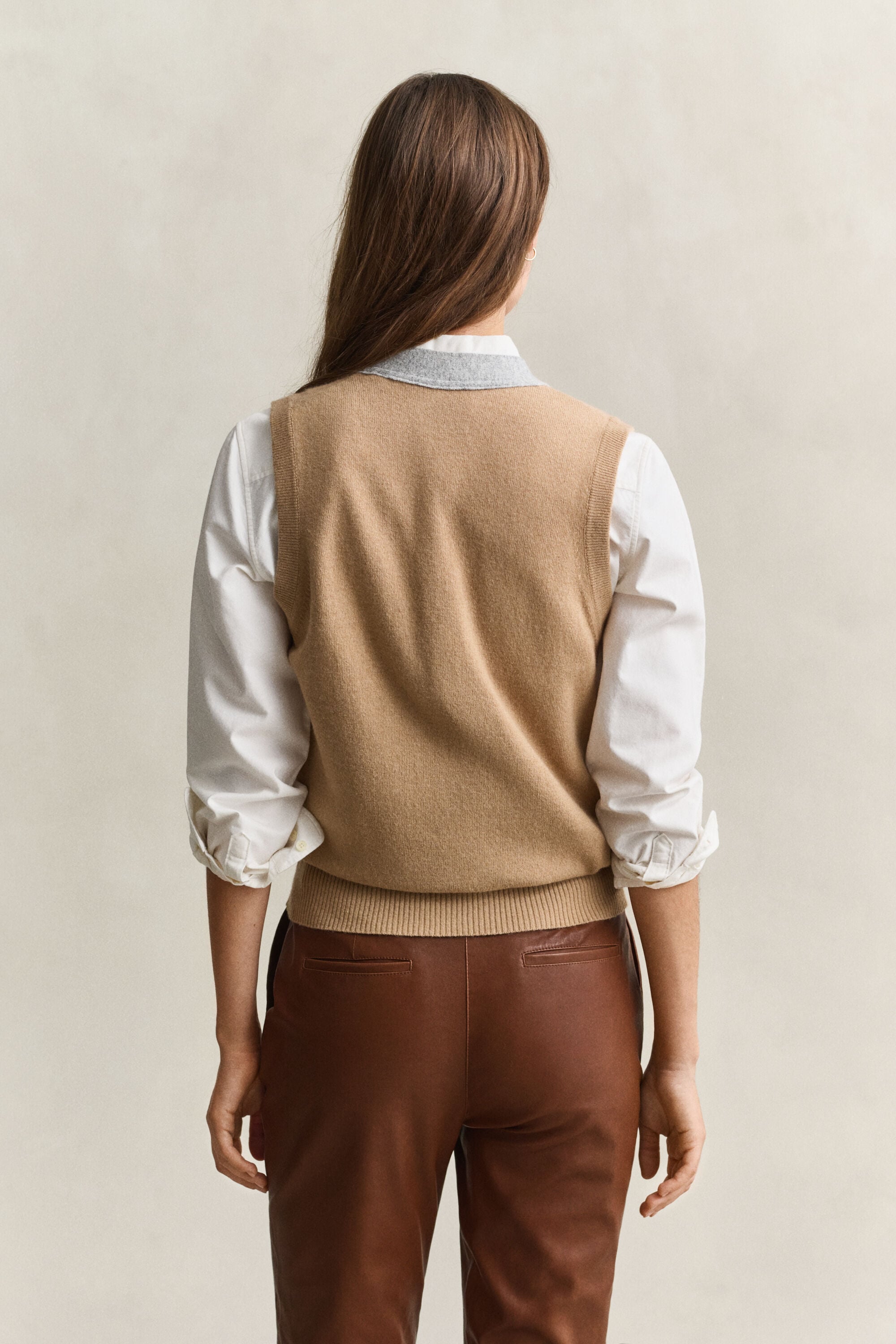 Piumino smanicato in maglia con colore a contrasto