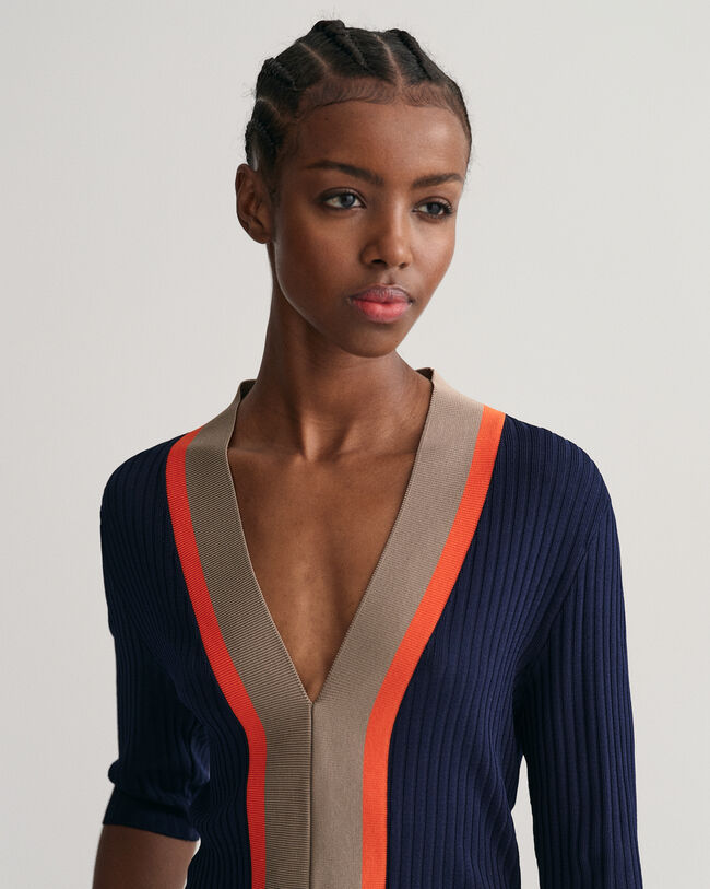 Top a coste con scollo a V