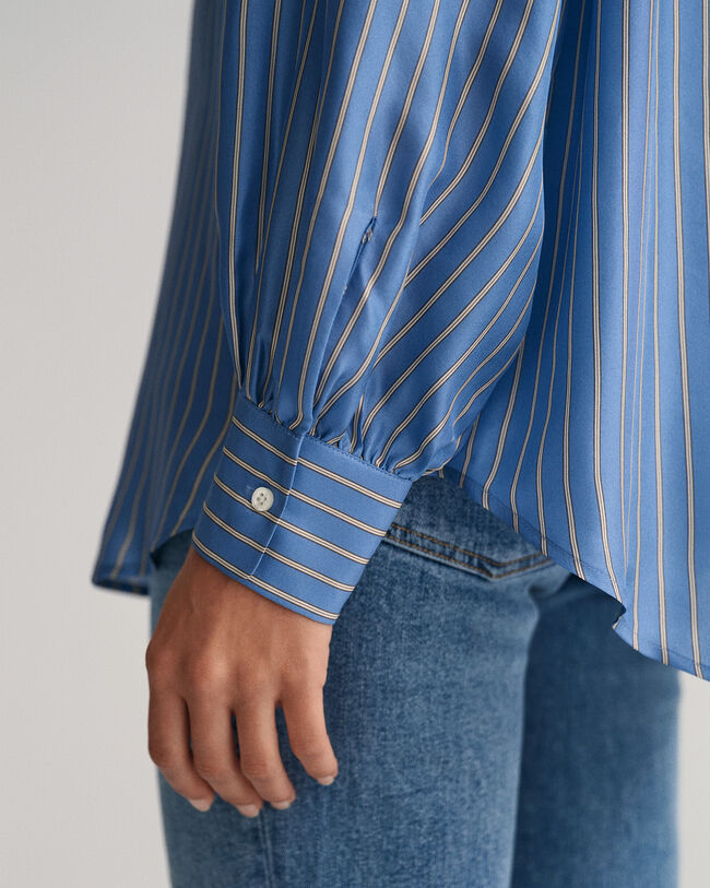 Blusa a righe in seta con fiocco