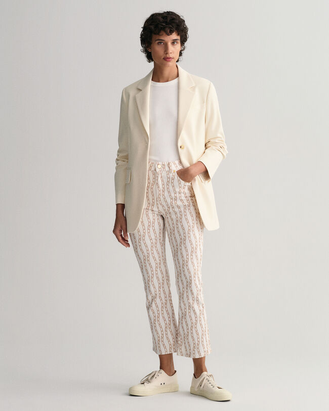 Jeans alla caviglia con stampa a catena