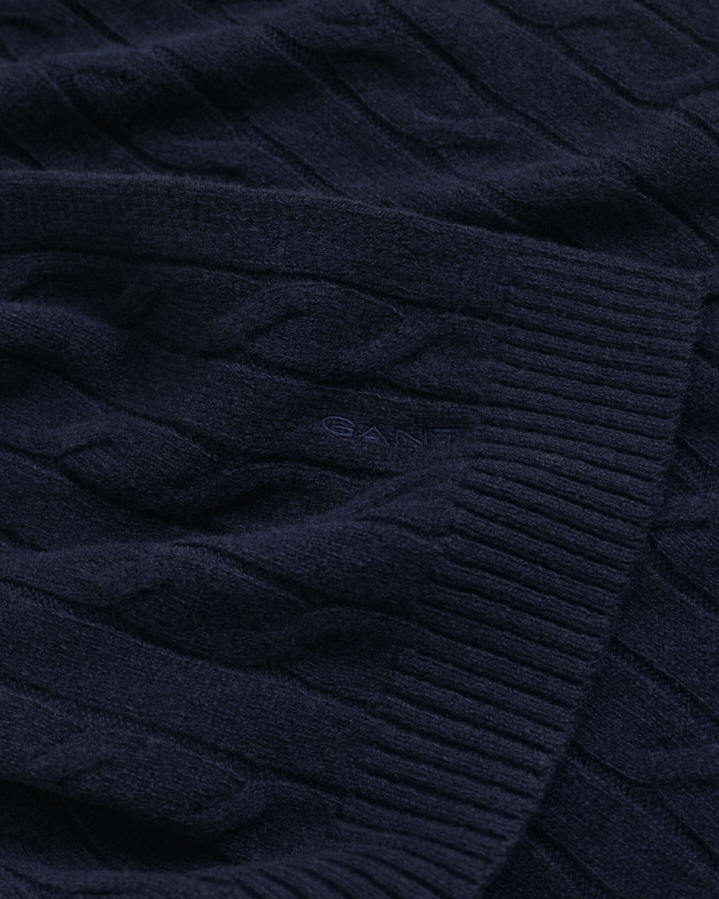 Sciarpa in lana a trecce