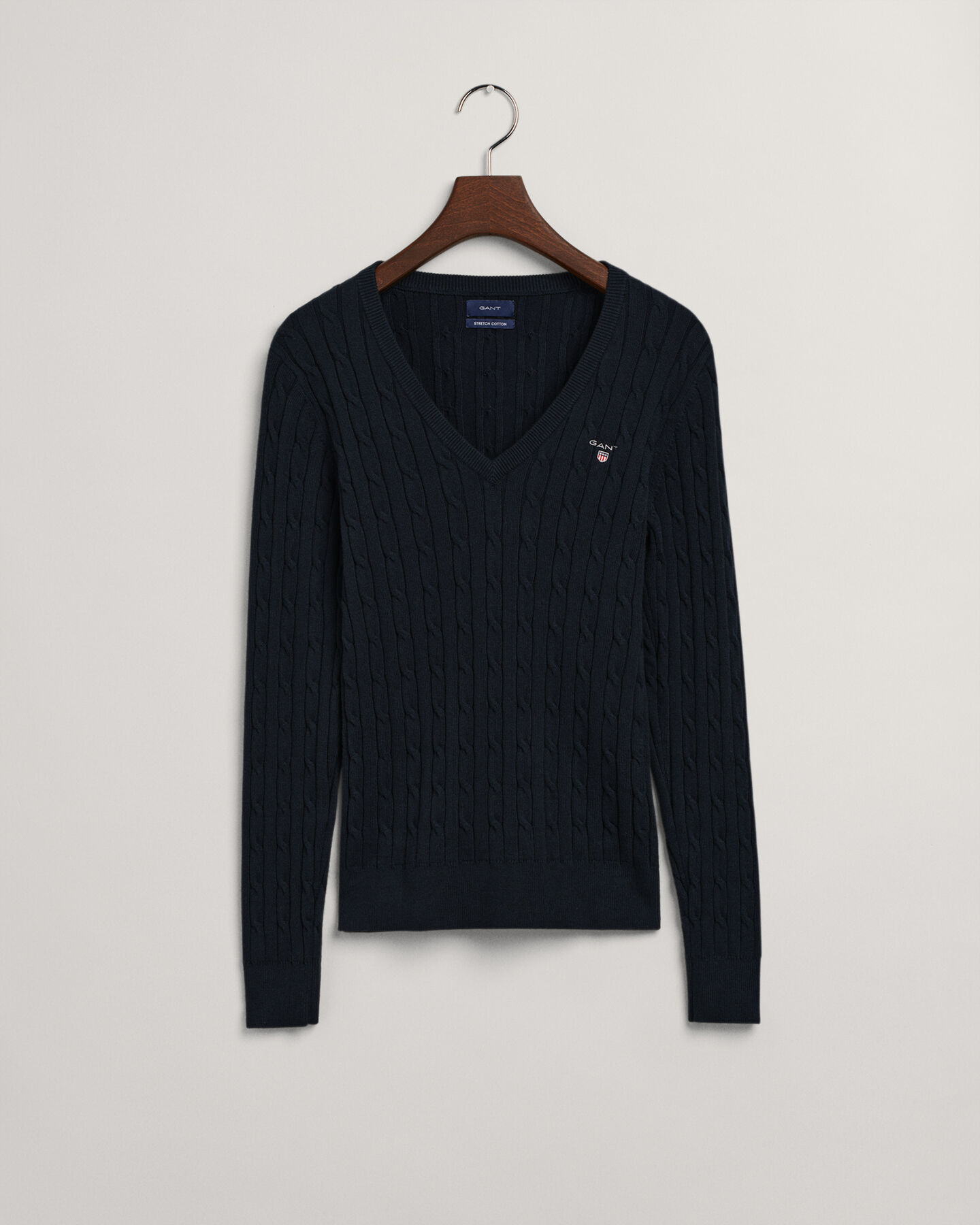 Maglia con scollo a V in cotone elasticizzato a trecce