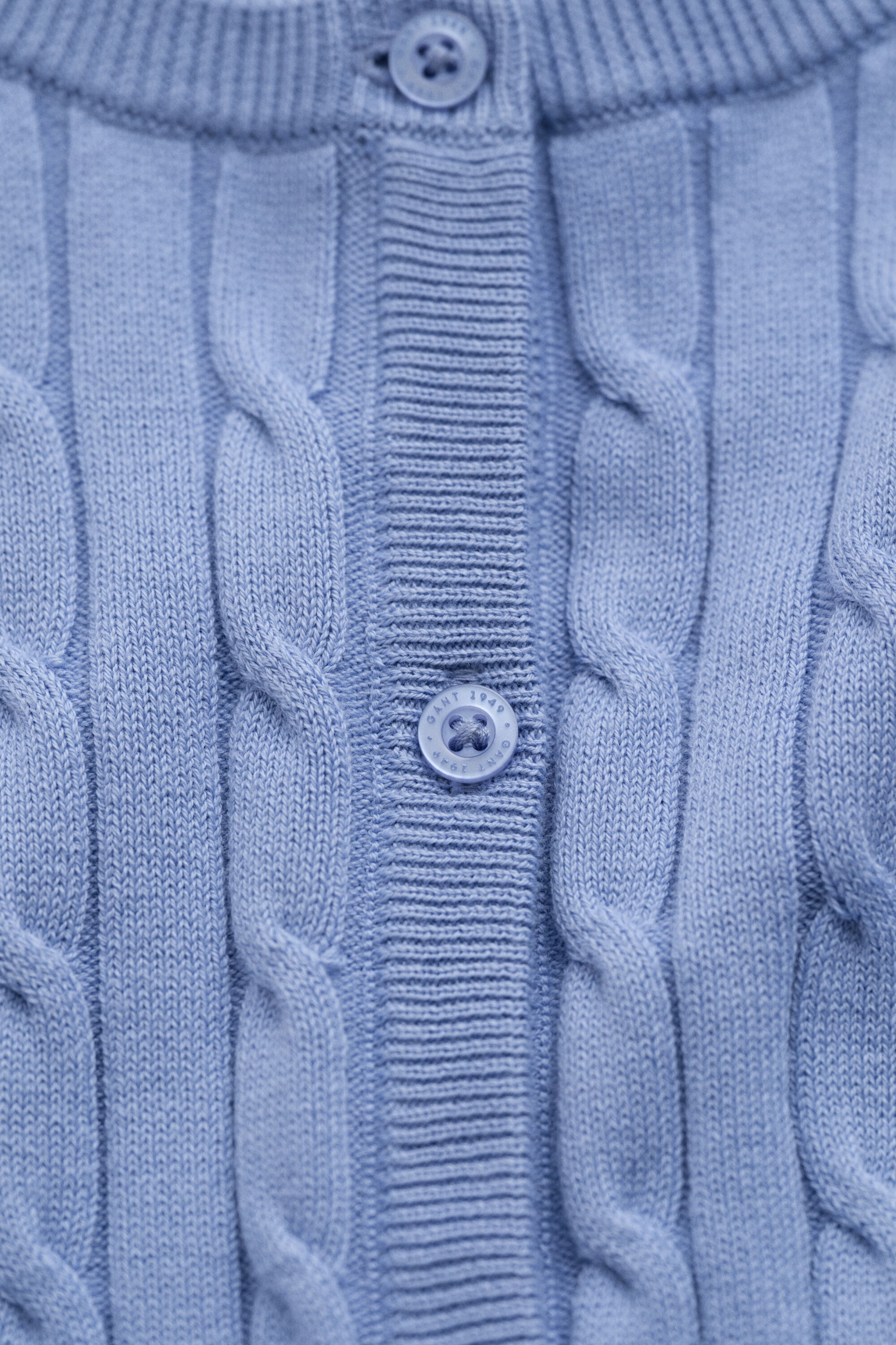 Cardigan in maglia di cotone elasticizzato a trecce
