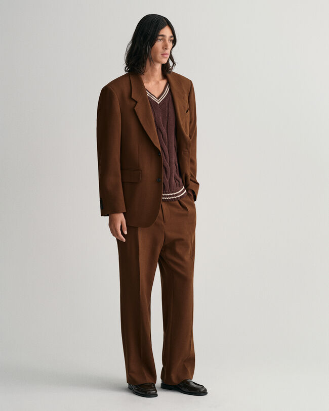 Smanicato in maglia a trecce