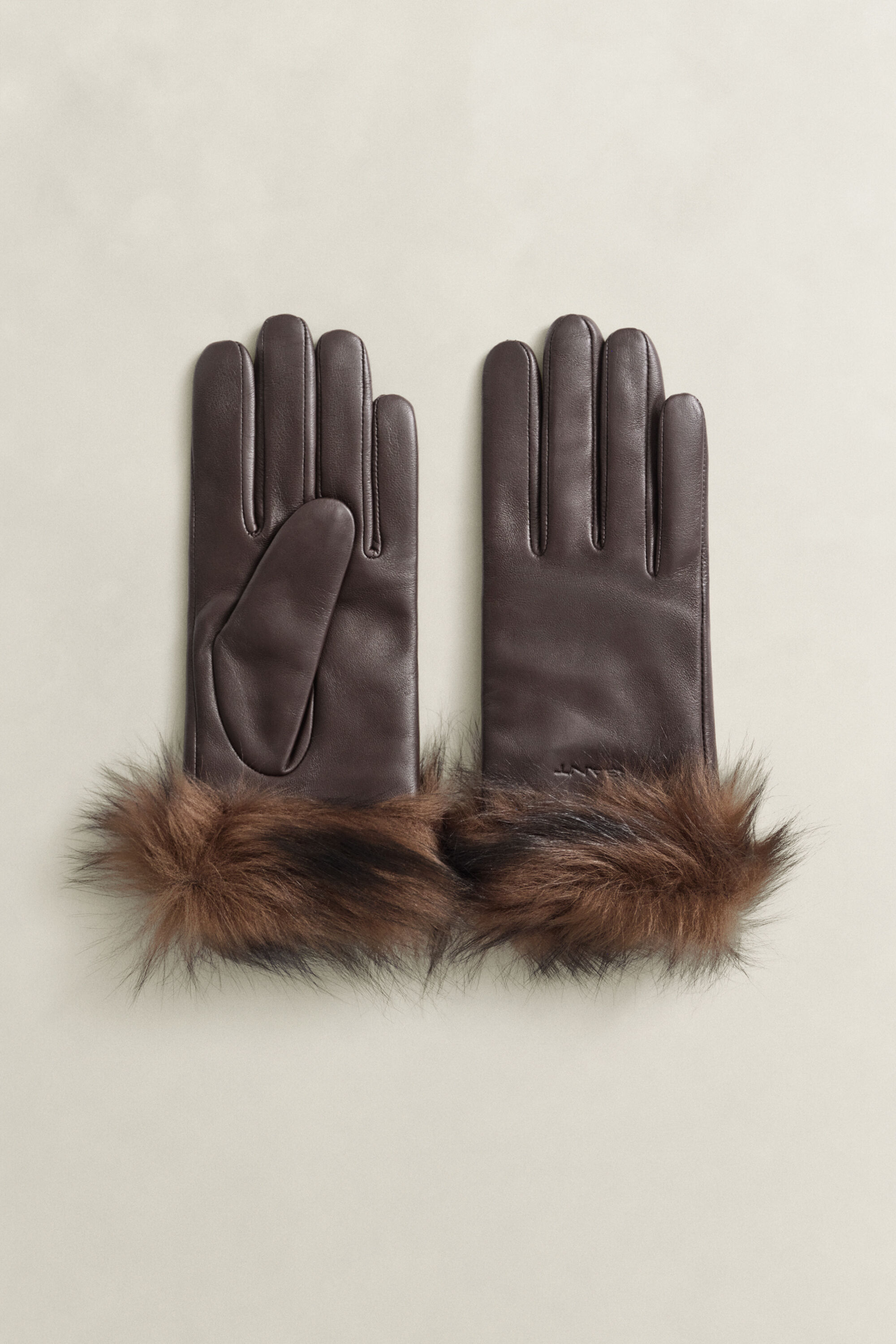 Guanti in pelle con polsini in shearling