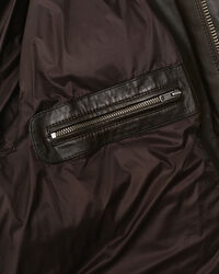 Piumino in pelle imbottito di piuma d’oca