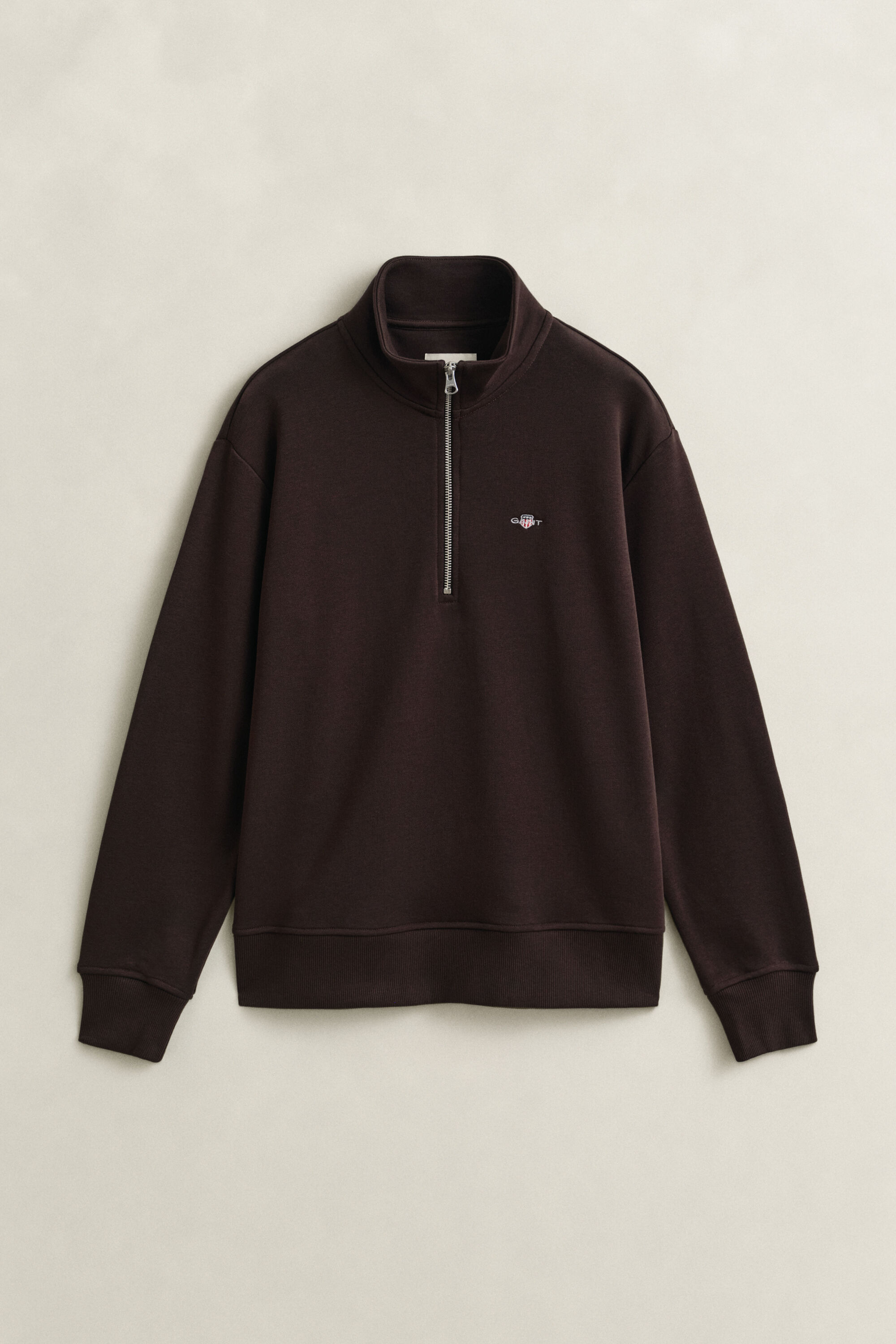 Felpa Shield con zip corta