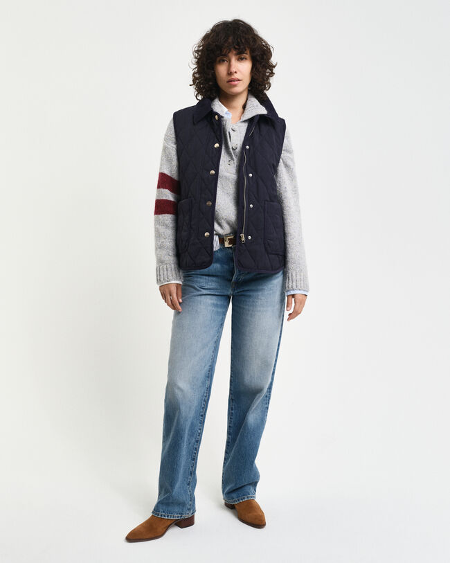 Piumino smanicato trapuntato con dettagli in velluto a coste