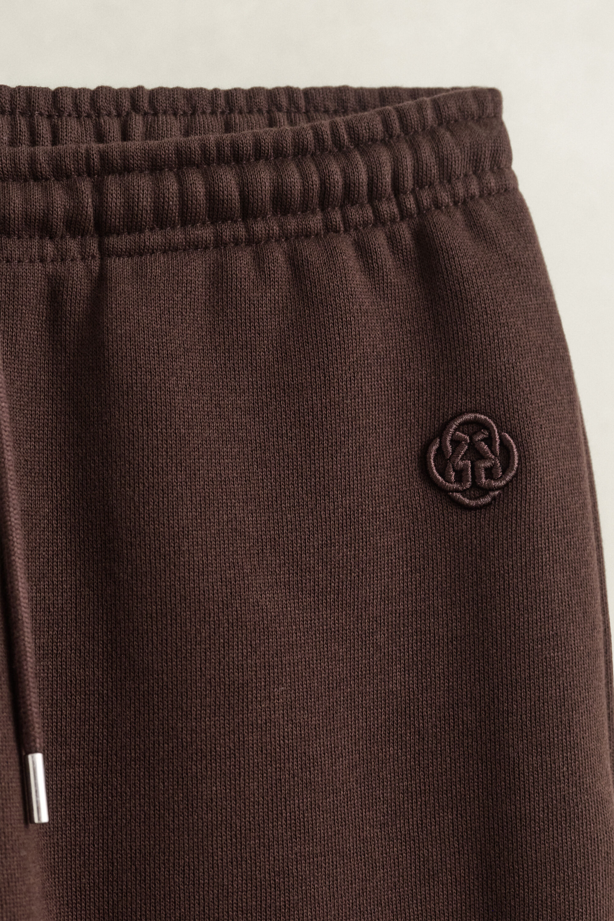 Pantaloni della tuta con ciondolo