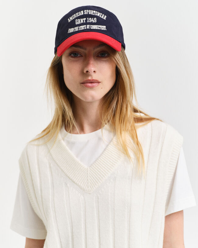 Gilet con scollo a V a coste in lana a coste ampie