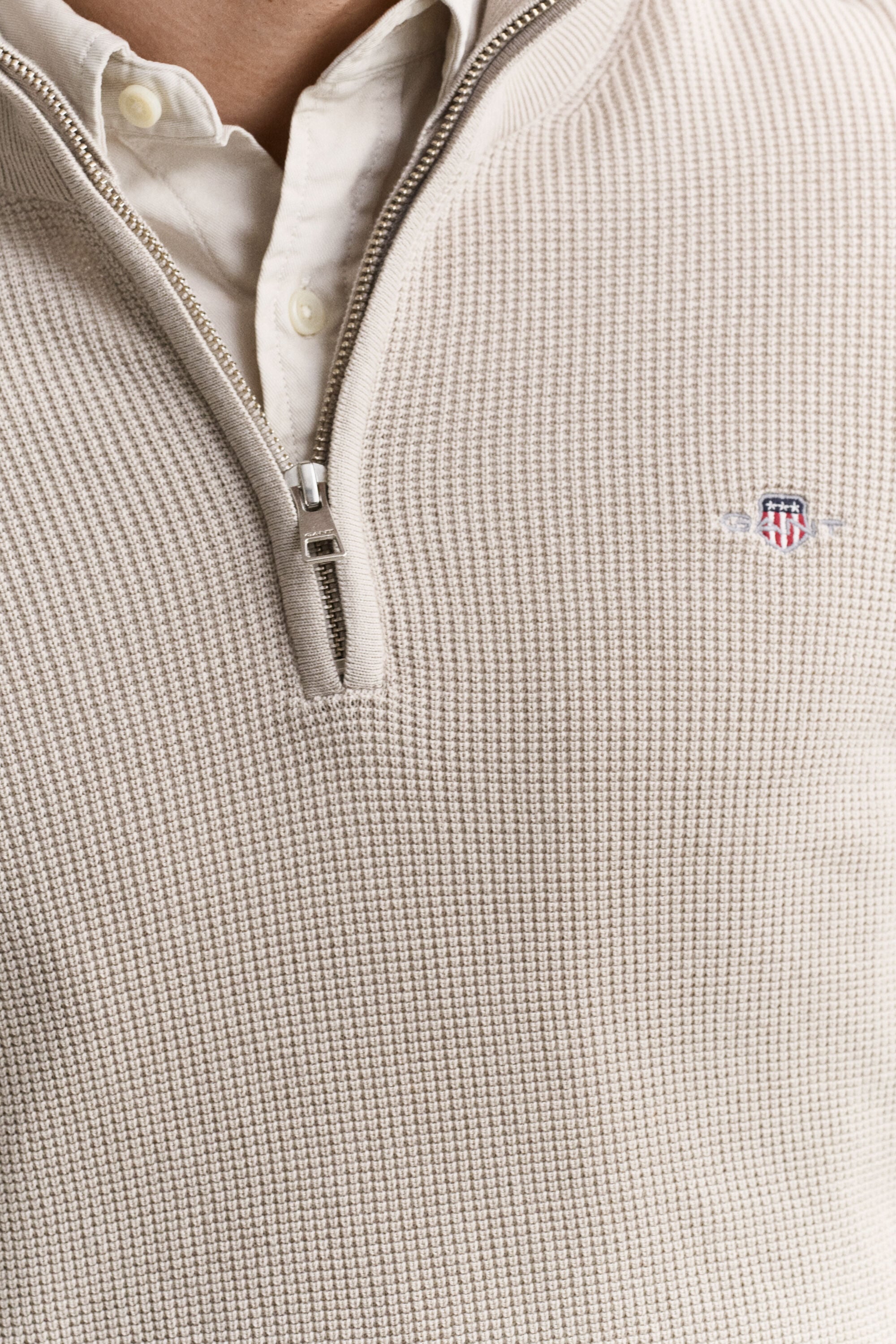 Maglia in cotone testurizzato con zip corta