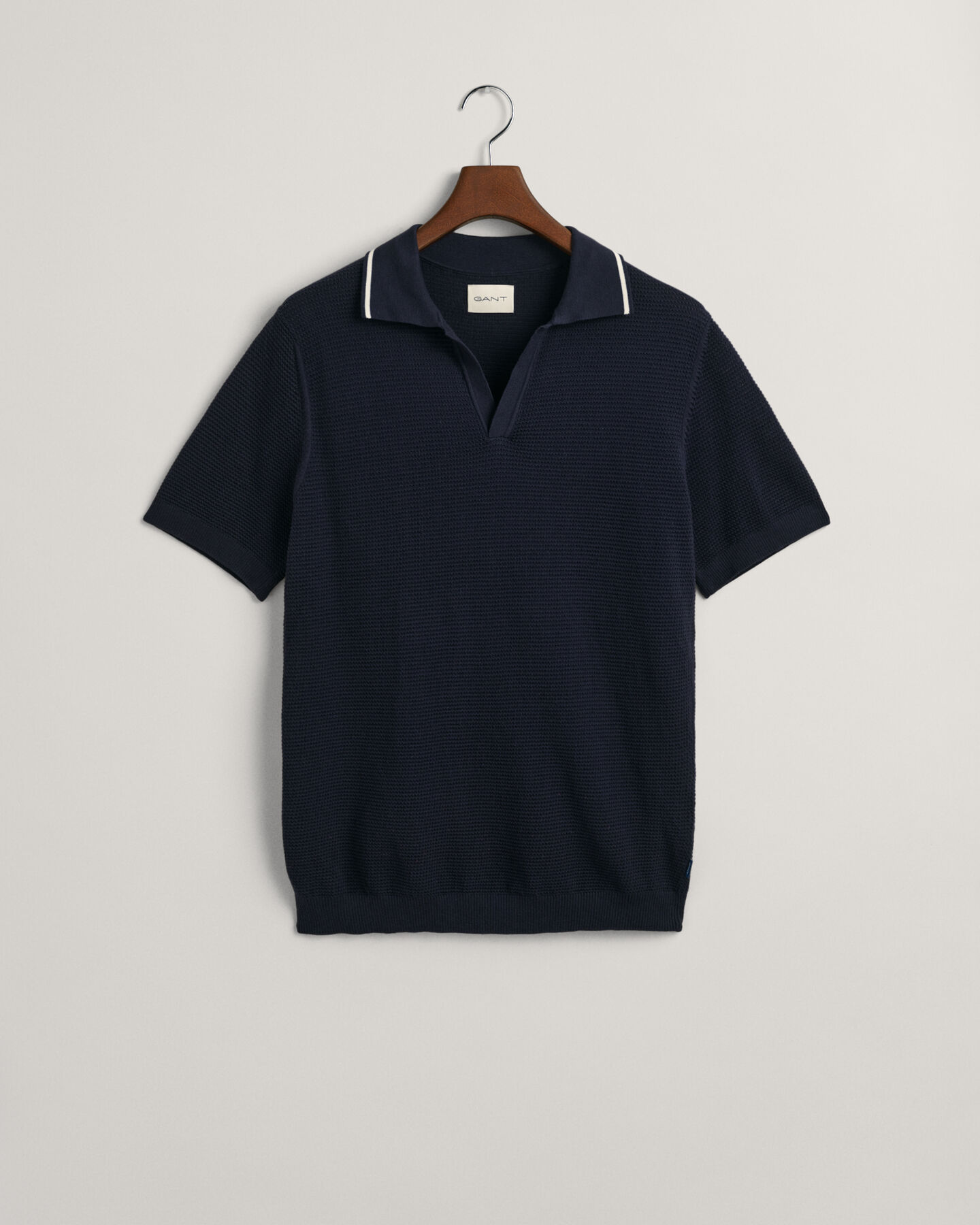 Maglia a polo testurizzata in cotone con colletto aperto