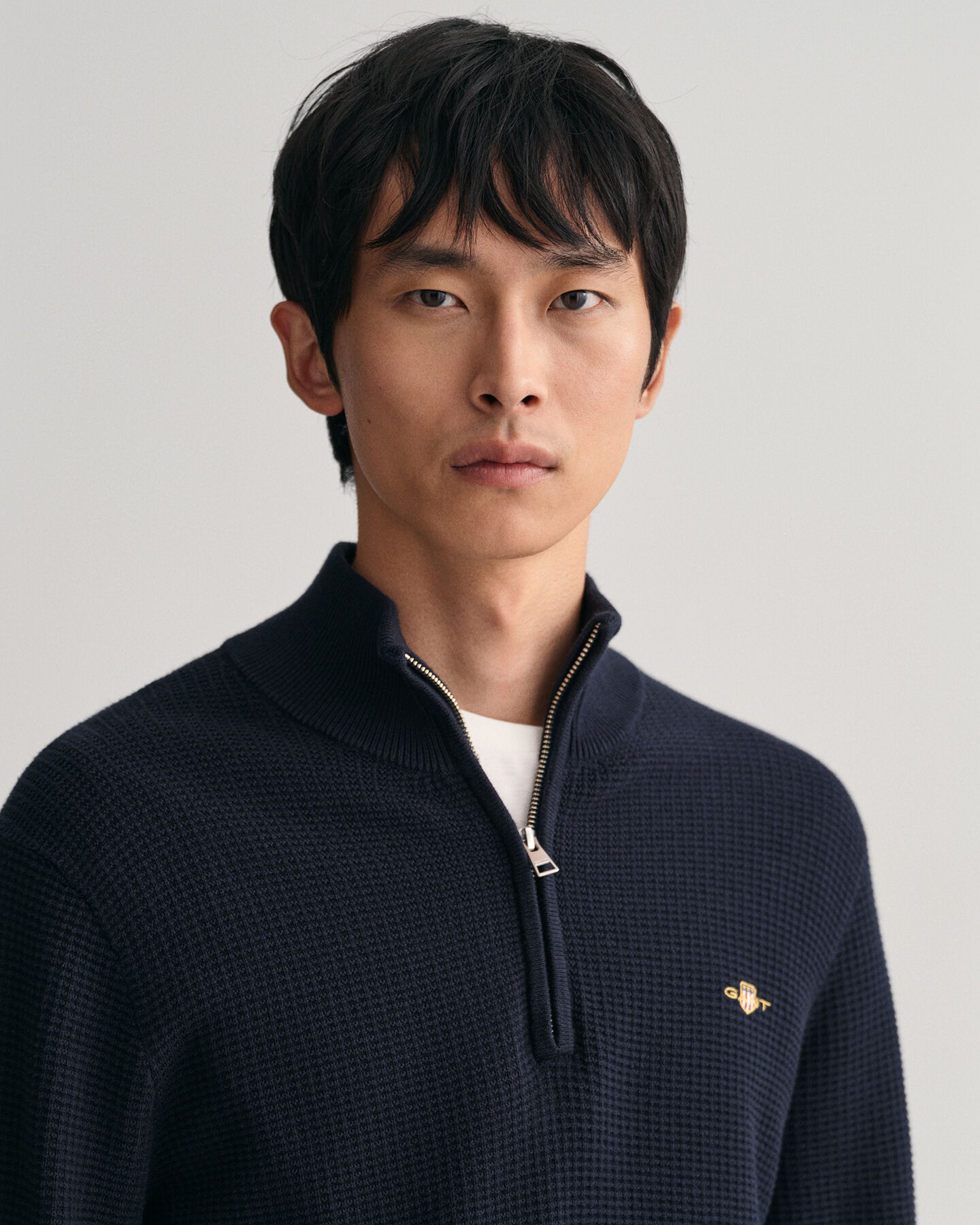 Maglia in cotone testurizzato con zip corta